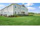 Well-maintained two-story house with a green lawn and beautiful landscaping at 103 Siebold St, Garner, NC 27529