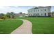 Well-kept lawns and sidewalk lead to a beautiful two-story home at 103 Siebold St, Garner, NC 27529