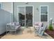 Relaxing patio area with comfortable seating, ideal for outdoor enjoyment and entertaining guests at 103 Siebold St, Garner, NC 27529