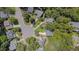 Aerial view of neighborhood streets lined with mature trees and well-maintained homes at 106 Dairy Ct, Chapel Hill, NC 27516