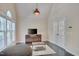 Spacious bedroom with French doors, tv, and windows at 106 Dairy Ct, Chapel Hill, NC 27516