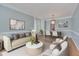 Dining area with hardwood floors and a light blue color scheme at 106 Dairy Ct, Chapel Hill, NC 27516