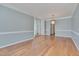 Bright dining room featuring hardwood floors and large windows at 106 Dairy Ct, Chapel Hill, NC 27516