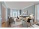 Spacious living room with bay windows and light blue walls at 106 Dairy Ct, Chapel Hill, NC 27516