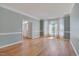 Living room with hardwood floors and bay windows at 106 Dairy Ct, Chapel Hill, NC 27516