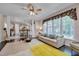 Bright and airy living room featuring hardwood floors and large windows at 106 Dairy Ct, Chapel Hill, NC 27516