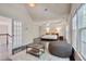 Open bedroom concept with access to balcony and seating area at 106 Dairy Ct, Chapel Hill, NC 27516