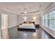 Spacious bedroom with tray ceiling, recessed lighting, and ample natural light at 106 Dairy Ct, Chapel Hill, NC 27516