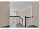 View of the staircase with chandelier above at 106 Dairy Ct, Chapel Hill, NC 27516