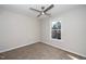 Well-lit bedroom featuring neutral carpet and a window at 110 Ethans Glenn Ct, Cary, NC 27513