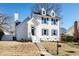 Charming two-story home with white siding, gray shutters, and a landscaped lawn at 110 Ethans Glenn Ct, Cary, NC 27513