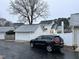 View of house exterior from the back with a car parked nearby at 110 Ethans Glenn Ct, Cary, NC 27513