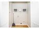Convenient laundry closet with shelving and wire racks at 110 Ethans Glenn Ct, Cary, NC 27513