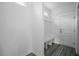 Welcoming entryway features a built-in bench and modern accents at 112 1St St, Oxford, NC 27565