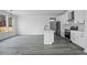 Open-concept kitchen with stainless steel appliances and an island perfect for entertaining at 112 1St St, Oxford, NC 27565