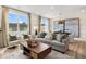 Spacious living room featuring stylish decor, comfortable seating, and large windows at 116 Kobus Ct, Garner, NC 27529