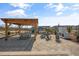 Relaxing pergola with fireplace and seating area at 116 Kobus Ct, Garner, NC 27529