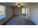 Spacious bedroom featuring carpet, ceiling fan and en-suite bathroom access at 120 Magnolia Run Way, Benson, NC 27504