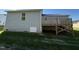 Rear view of house showing deck and backyard at 120 Magnolia Run Way, Benson, NC 27504