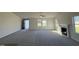 Spacious living room featuring a fireplace, vaulted ceilings and lots of natural light at 120 Magnolia Run Way, Benson, NC 27504