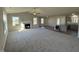 Open concept living area with kitchen, fireplace, and lots of natural light at 120 Magnolia Run Way, Benson, NC 27504