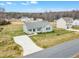 Aerial view of a single-story house and its surrounding area at 120 Starry Sky Dr, Benson, NC 27504
