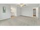 Bright bedroom with ceiling fan and access to bathroom at 120 Starry Sky Dr, Benson, NC 27504
