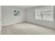 Bedroom with window, wall art and carpet flooring at 120 Starry Sky Dr, Benson, NC 27504