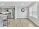 Dining area with hardwood floors and kitchen views at 120 Starry Sky Dr, Benson, NC 27504