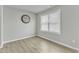 Bright dining room with hardwood floors and large window at 120 Starry Sky Dr, Benson, NC 27504