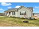 Side view of a gray house with landscaping at 120 Starry Sky Dr, Benson, NC 27504