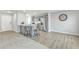 Kitchen with grey cabinetry, granite countertops, and breakfast bar at 120 Starry Sky Dr, Benson, NC 27504