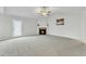 Living room with fireplace and vaulted ceiling at 120 Starry Sky Dr, Benson, NC 27504