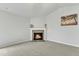 Living room with corner fireplace and carpet at 120 Starry Sky Dr, Benson, NC 27504