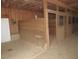 Interior of barn showcasing wooden stalls at 1200 Spring Valley Lake Rd, Henderson, NC 27536