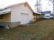 Exterior shot of the garage, showing its ample size and potential for vehicle storage at 1200 Spring Valley Lake Rd, Henderson, NC 27536