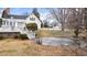 Backyard with patio and stairway leading to back of house at 1200 Spring Valley Lake Rd, Henderson, NC 27536
