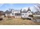 Wide view of home's backyard and multi-level deck and porch at 1200 Spring Valley Lake Rd, Henderson, NC 27536