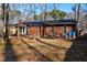 Well-maintained home featuring a partially covered deck and a spacious backyard at 1225 Kilmory Dr, Cary, NC 27511