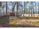 Large, fenced backyard provides security and privacy with shed for outdoor storage at 1225 Kilmory Dr, Cary, NC 27511