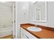 Bathroom with vanity, sink, and mirror at 1225 Kilmory Dr, Cary, NC 27511