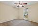 Bedroom with ceiling fan and window at 1225 Kilmory Dr, Cary, NC 27511