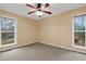 Bright bedroom with two windows and a ceiling fan at 1225 Kilmory Dr, Cary, NC 27511