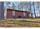 Cozy home surrounded by mature trees, providing shade and privacy at 1225 Kilmory Dr, Cary, NC 27511