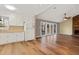 Eat-in kitchen with white cabinets and wood countertops at 1225 Kilmory Dr, Cary, NC 27511