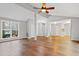 Bright living area with hardwood floors and kitchen view at 1225 Kilmory Dr, Cary, NC 27511