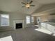 Spacious living room featuring a fireplace and vaulted ceiling at 125 Hydrangea Ln, Benson, NC 27504