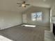 Living room with fireplace and view of the front yard at 125 Hydrangea Ln, Benson, NC 27504