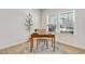 Bright home office with wood desk, chair, and decorative rug at 128 Curling Creek Dr, Clayton, NC 27527