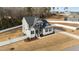 Expansive property featuring a well-manicured lawn, fenced yard, and an inviting two-story home at 128 S Clearbrook Ct, Angier, NC 27501